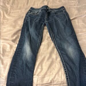 Blue Boot Cut Jeans with Faded Design